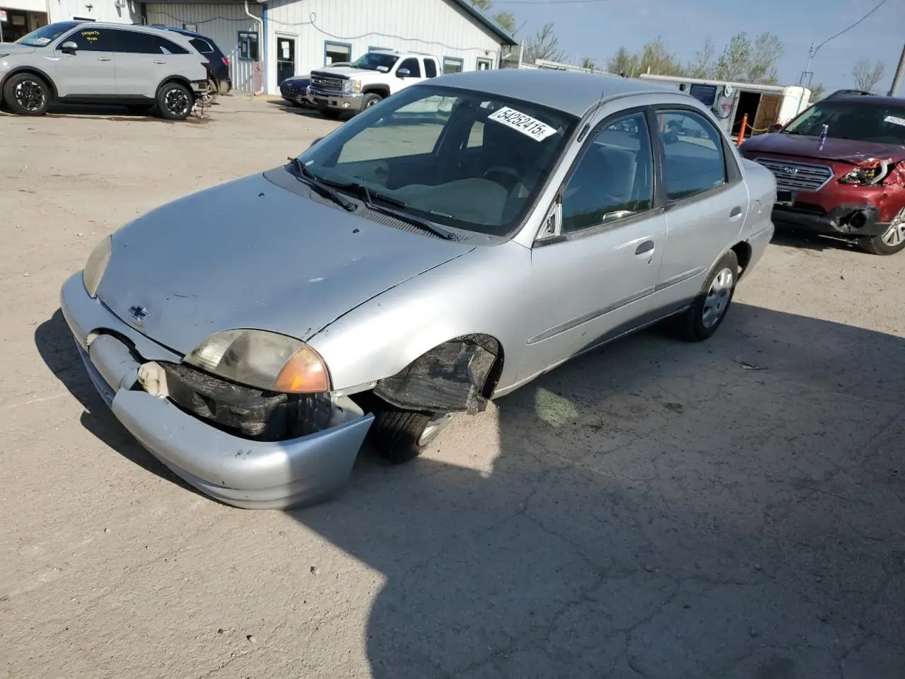 CHEVROLET METRO 1999. Lot# 54252415. VIN 2C1MR5226X6710571. Photo 1