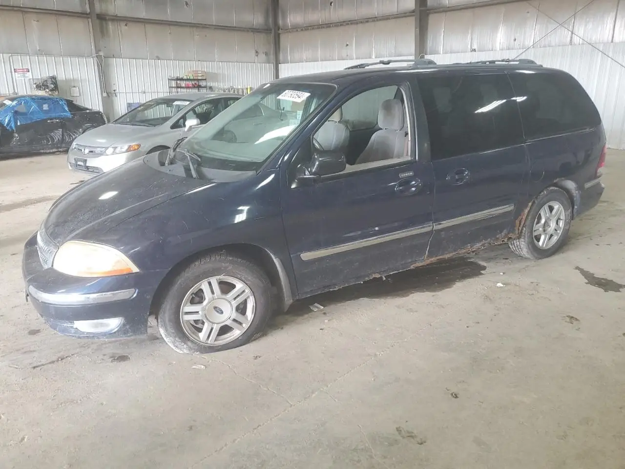 FORD WINDSTAR 2002. Lot# 57078825. VIN 2FMZA52412BB04012. Photo 1
