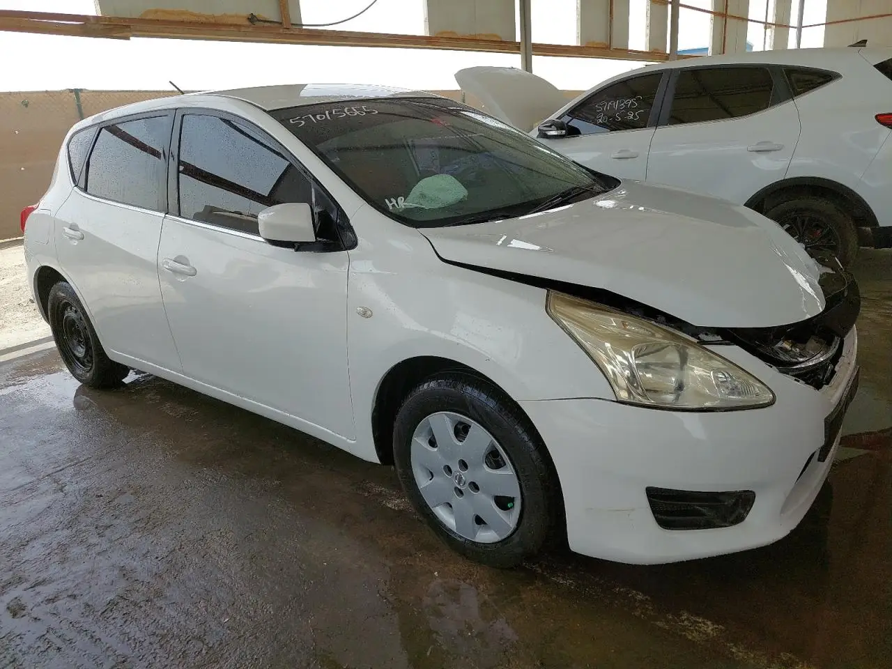 NISSAN TIIDA 2014. Lot# 57015665. VIN MNTBC2C93E6002828. Photo 1