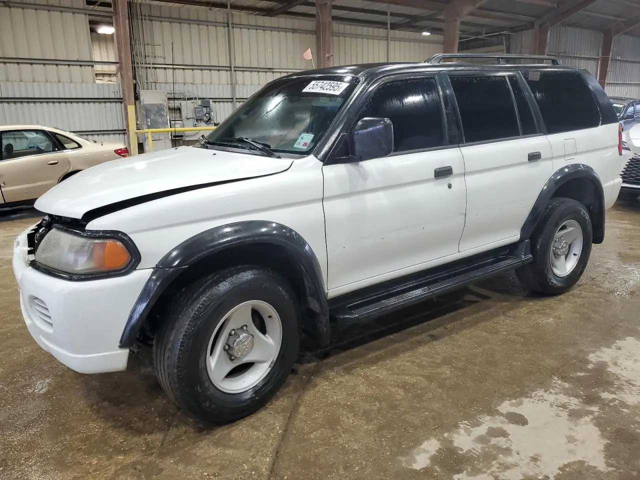 MITSUBISHI MONTERO 2001. Lot# 55742595. VIN JA4LS21H31P054967. Photo 1