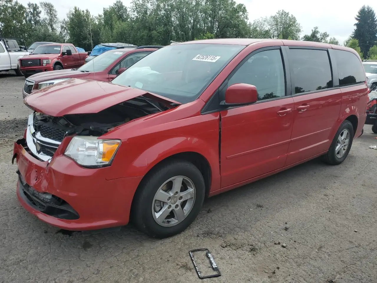 DODGE CARAVAN 2013. Lot# 62526115. VIN 2C4RDGCG4DR520694. Photo 1