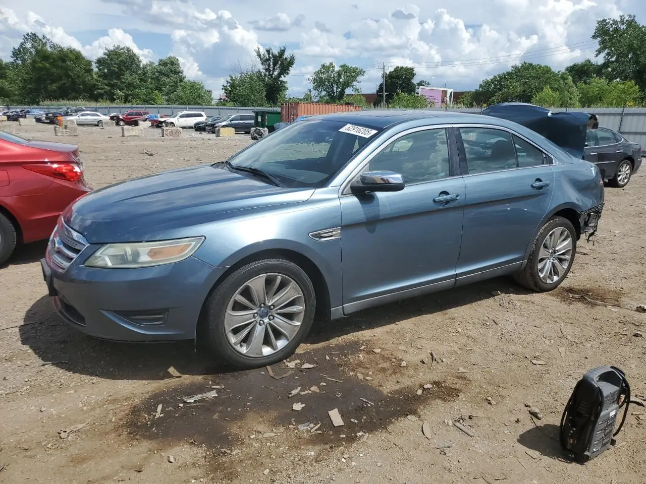 FORD TAURUS 2010. Lot# 62916205. VIN 1FAHP2FW8AG137448. Photo 1