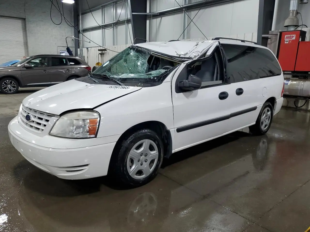 FORD FREESTAR 2005. Lot# 62507965. VIN 2FMZA51665BA71516. Photo 1