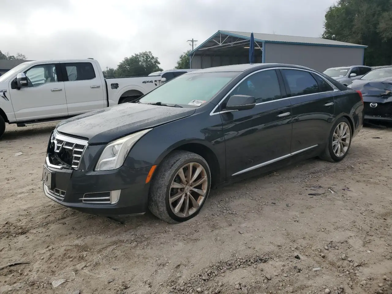 CADILLAC XTS 2013. Lot# 61463525. VIN 2G61S5S36D9141446. Photo 1