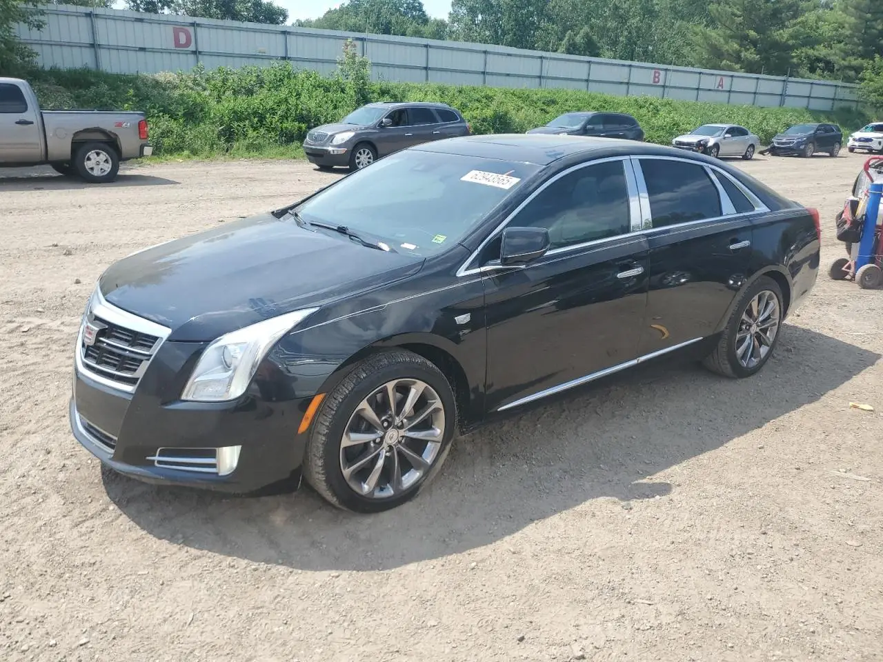 CADILLAC XTS 2013. Lot# 62943565. VIN 2G61P5S32D9157466. Photo 1