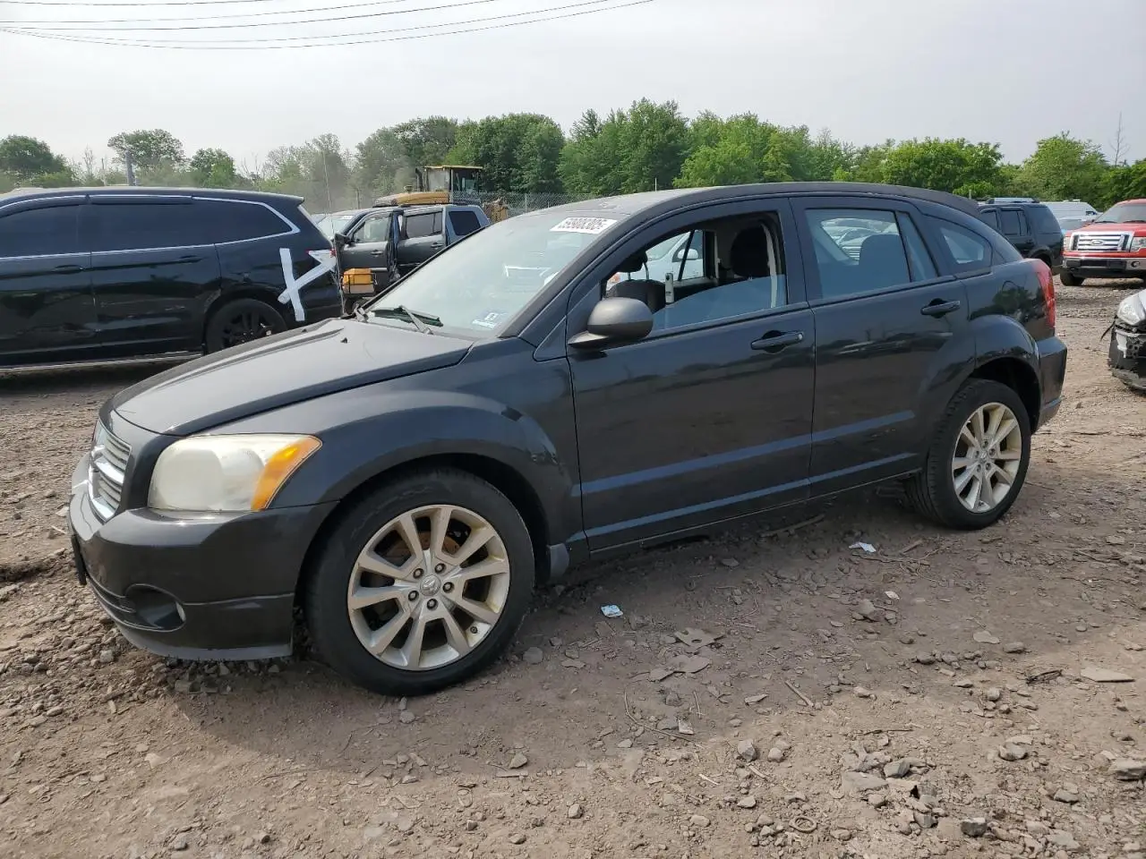 DODGE CALIBER 2010. Lot# 59908305. VIN 1B3CB5HA9AD641998. Photo 1