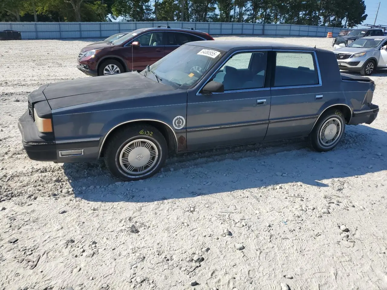 DODGE DYNASTY 1989. Lot# 64080955. VIN 1B3BC4632KD615753. Photo 1