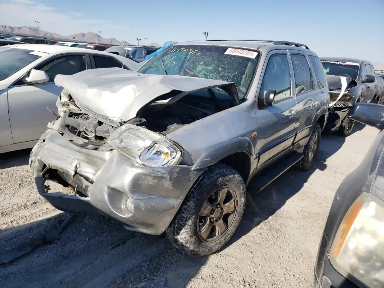 MAZDA TRIBUTE 2002. Lot# 68048205. VIN 4F2YU09132KM66578. Photo 1